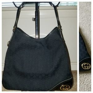 Authentic Gucci Black Canvas and Leather
